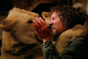 FOR SUNDAY PULSE -- FILM STILL  CAPTION:ROAR_Kiss: Hank (Noel Marshall) receives a kiss from one of the lions in Drafthouse Films Roar. Courtesy of Drafthouse Films.